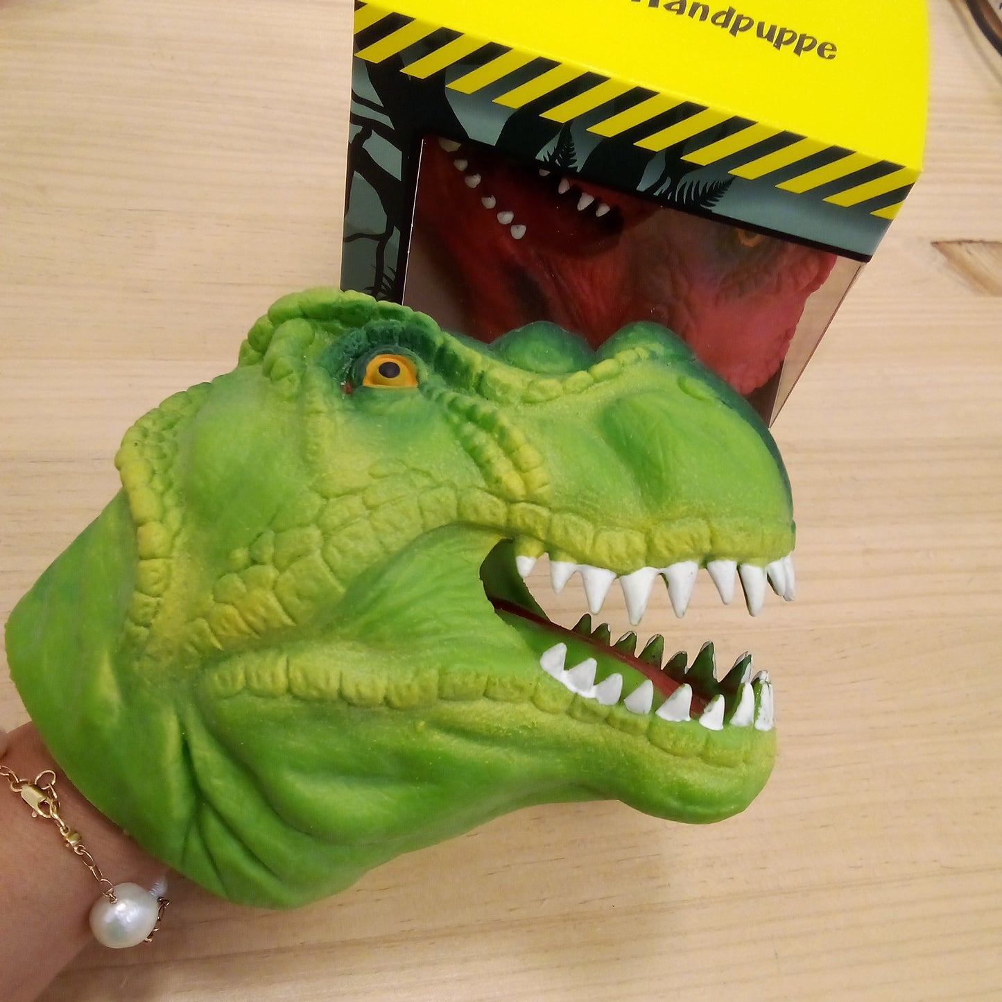 Marioneta de silicona dinosaurio