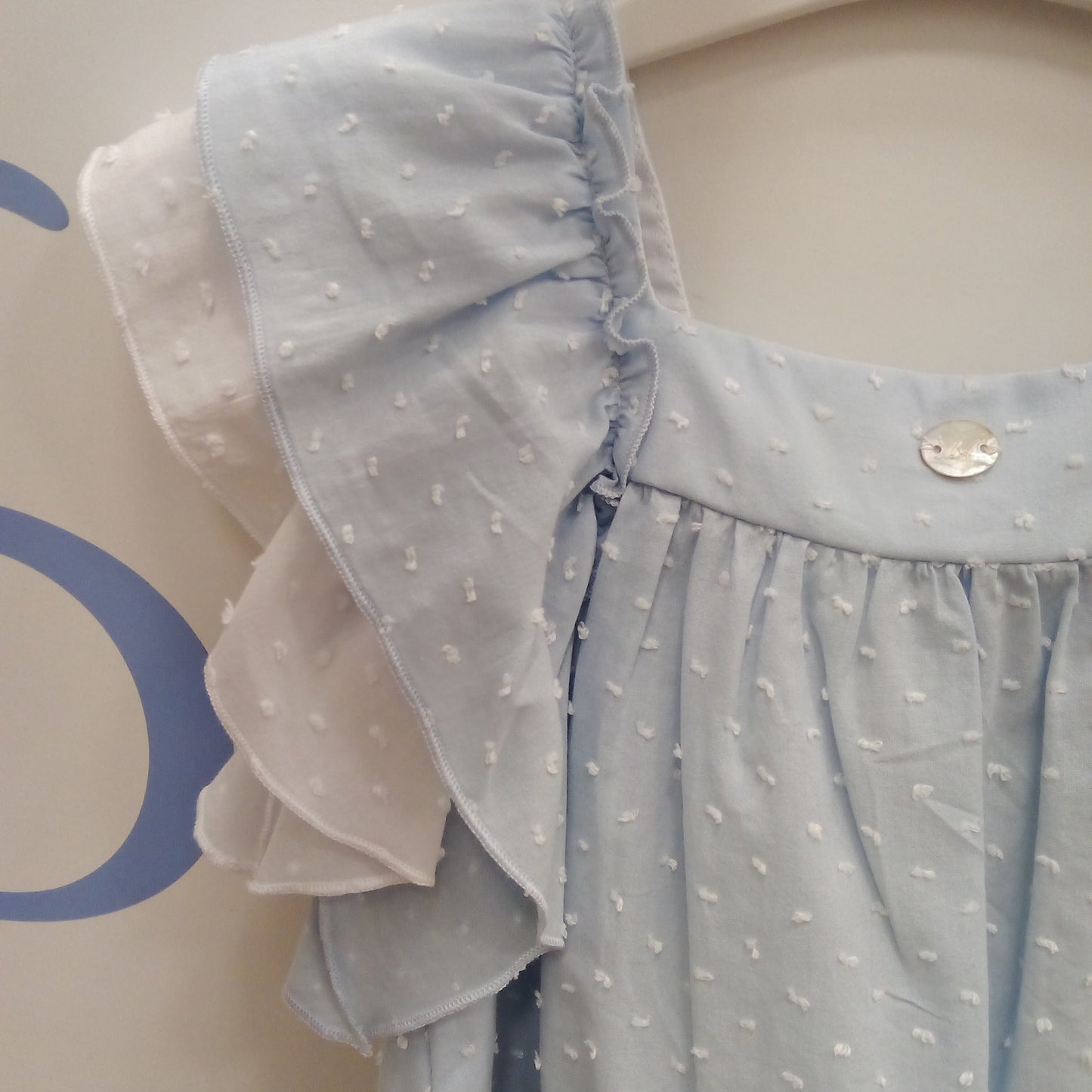 Vestido plumeti azul cielo