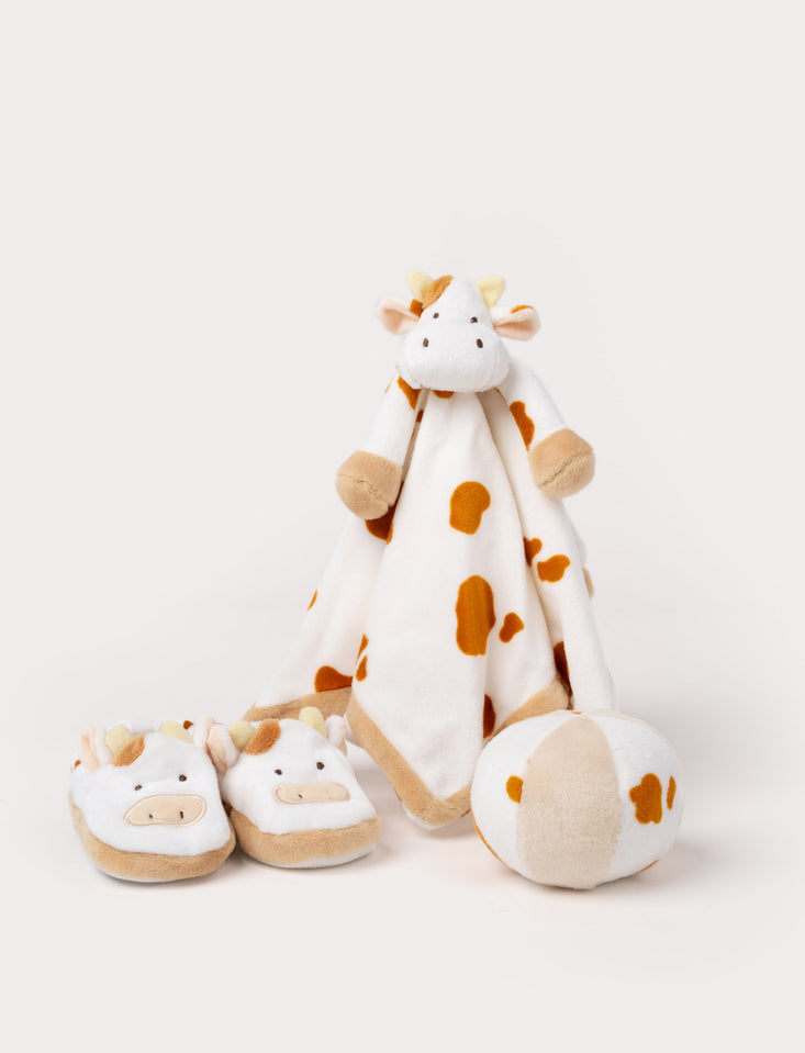 Caja con doudou, zapatillas y juguete vaca